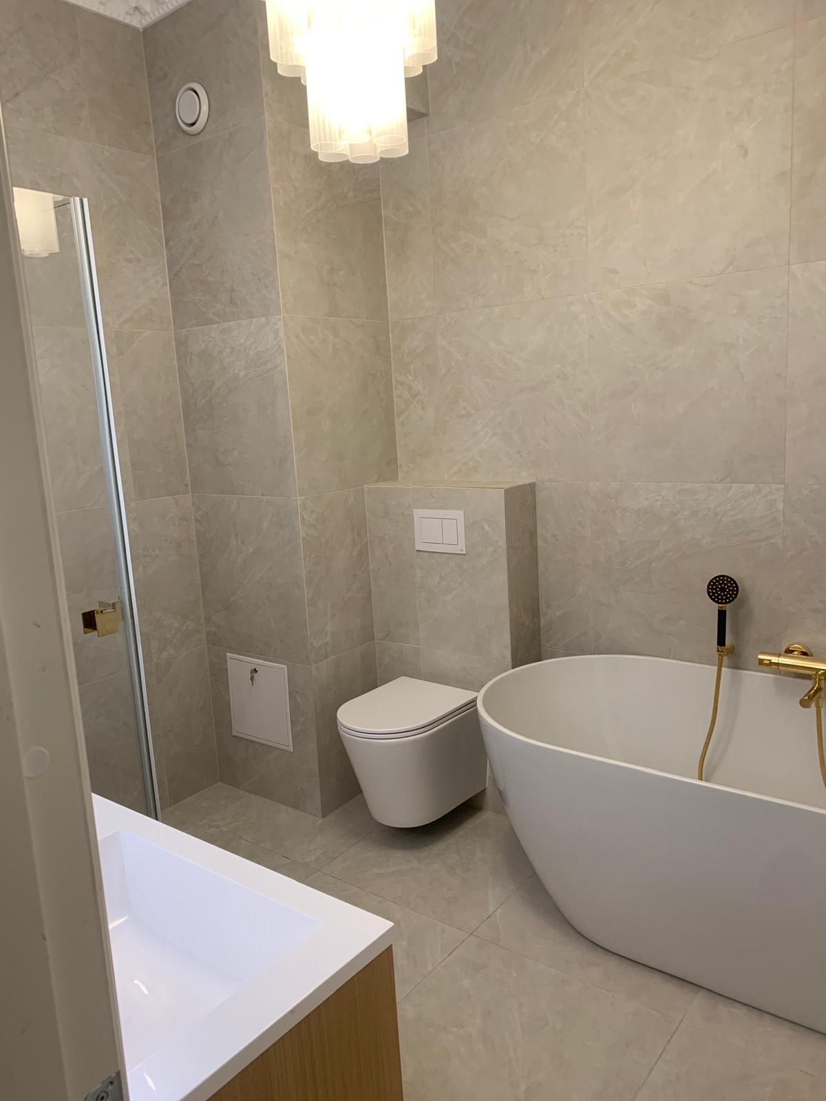 Bathtub, toilet and shower
