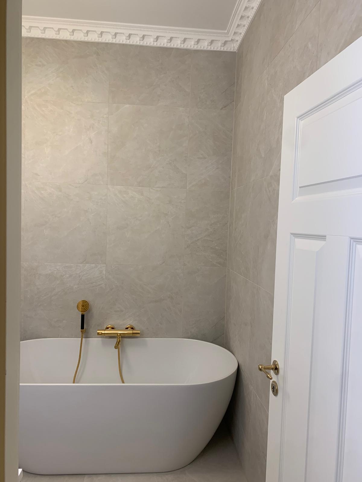 Detail — brass fittings and cornice